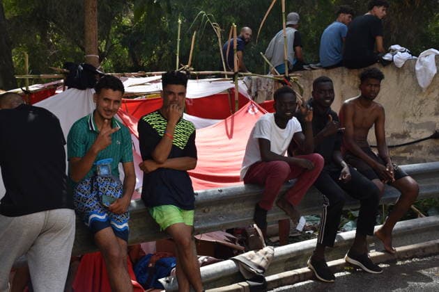 Hundreds of people are swimming across to Ceuta from Morocco, with a crowd waiting on the other side of the border. Several people are waiting at the Temporary Immigrant Shelter (CETI) on July 30, 2026, in Ceuta, Spain. Hundreds of people of Maghreb origin have crossed into Ceuta from Morocco throughout the morning, either by swimming or along the breakwater, and a crowd is waiting on the other side of the border to enter the autonomous city in the same way. Over the past week, more than 2,000 migrants have already done so. JULY 30, 2026 Europa Press 07 30 2026 Ceuta Ceuta, Spain  Copyright: xEuropaxPressx 7695870