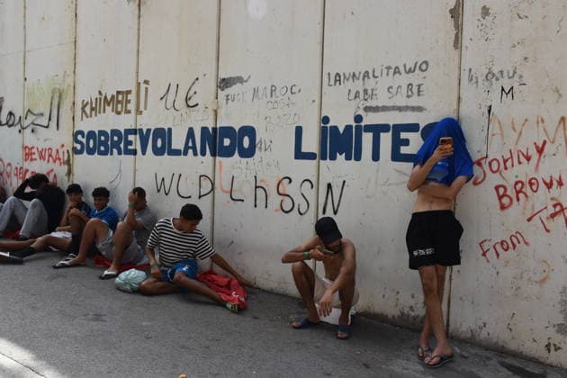 Hundreds of people are swimming across to Ceuta from Morocco, with a crowd waiting on the other side of the border. Several people are waiting at the Temporary Immigrant Shelter (CETI) on July 30, 2026, in Ceuta, Spain. Hundreds of people of Maghreb origin have crossed into Ceuta from Morocco throughout the morning, either by swimming or along the breakwater, and a crowd is waiting on the other side of the border to enter the autonomous city in the same way. Over the past week, more than 2,000 migrants have already done so. JULY 30, 2026 Europa Press 07 30 2026 Ceuta Ceuta, Spain  Copyright: xEuropaxPressx 7695872