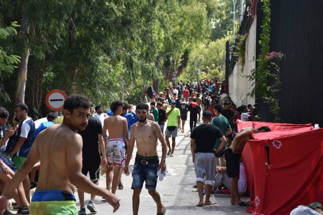 Hundreds of people are swimming across to Ceuta from Morocco, with a crowd waiting on the other side of the border. Dozens of people are waiting at the Temporary Immigrant Shelter (CETI) on July 30, 2026, in Ceuta, Spain. Hundreds of people of Maghreb origin have crossed into Ceuta from Morocco throughout the morning, either by swimming or by climbing the breakwater, and a crowd is waiting on the other side of the border to enter the autonomous city in the same way. Over the past week, more than 2,000 migrants have already done so. JULY 30, 2026 Europa Press 07 30 2026 Ceuta, Spain  Copyright: xEuropaxPressx 7695873