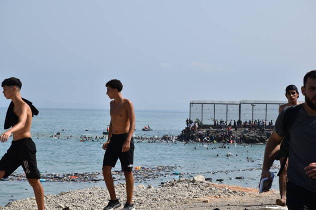 Hundreds of people are swimming across to Ceuta from Morocco, with a crowd waiting on the other side of the border. Several people are crossing the border on July 30, 2026, in Ceuta, Spain. Hundreds of people of Maghreb origin have crossed into Ceuta from Morocco throughout the morning, either by swimming or along the breakwater, and a crowd is waiting on the other side of the border to enter the autonomous city in the same way. Over the past week, more than 2,000 migrants have already done so. JULY 30, 2026 Europa Press 07 30 2026 Ceuta, Spain  Copyright: xEuropaxPressx 7695880
