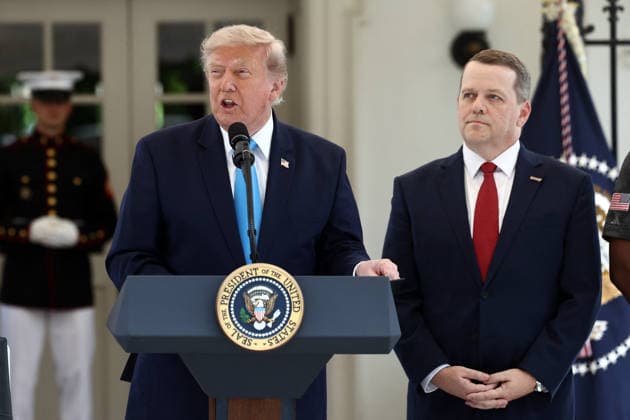 US President Trump makes an announcment on veterans eligiablity for the Freedom Haulers program Werner Enterprises President Nathan Meisgeier (R) as US President Donald Trump (L) announces a program to allow veterans to expedite a career in commercial trucking outside the White House in Washington, DC, USA, 30 July 2026. Known as the Freedom Haulers program, the initiative would allow any US veteran who drove heavy equipment to be automatically eligible for a commercial trucking license. WASHINGTON DC United States  Copyright: xPool ABACAx