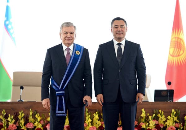 Kyrgyz President Japarov - Uzbek President Mirziyoyev meeting in Kyrgyzstan CHOLPON-ATA, KYRGYZSTAN - JULY 30: (----EDITORIAL USE ONLY - MANDATORY CREDIT - KYRGYZ PRESIDENCY HANDOUT - NO MARKETING NO ADVERTISING CAMPAIGNS - DISTRIBUTED AS A SERVICE TO CLIENTS----) Kyrgyz President Sadyr Japarov (R) presents Uzbek President Shavkat Mirziyoyev (L) with the Order of Manas, First Class, the highest state award of Kyrgyzstan, during a signing ceremony in Cholpon-Ata on the shores of Lake Issyk-Kul, Kyrgyzstan, on July 30, 2026. Kyrgyz Presidency Handout Anadolu Cholpon-ata Kyrgyzstan. Editorial use only. Please get in touch for any other usage.  Copyright: x2026xAnadoluxKyrgyzxPresidencyx xHandoutx
