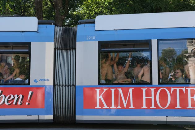 Munich residents ride trams in swimwear after cooling off in Eisbach, a summer routine in the city MUNICH, GERMANY - JULY 30: Passengers in swimwear crowd a tram after cooling off in the Eisbach river, as Munich residents traditionally do in summer, in Munich, Germany, on July 30, 2026. Munich records its hottest July 30 since 1947. Merve Goettl Anadolu Munich Germany. Editorial use only. Please get in touch for any other usage.  Copyright: x2026xAnadoluxMervexGoettlx