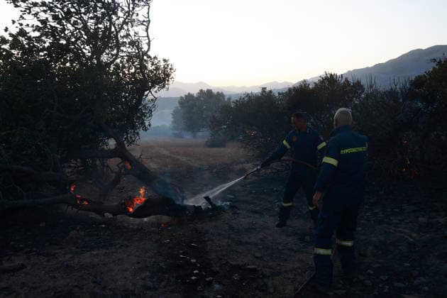 Forest fire in the Greek island of Crete CRETE, GREECE - JULY 30: Firefighters continue their efforts to extinguish the wildfire near the village of Agia Paraskevi, in Rethymno, on the island of Crete, Greece, on July 30, 2026. Costas Baltas Anadolu Crete Greece. Editorial use only. Please get in touch for any other usage.  Copyright: x2026xAnadoluxCostasxBaltasx