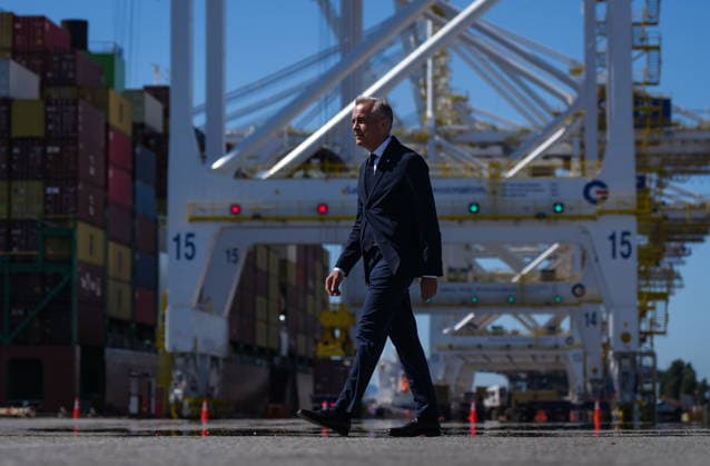 July 30, 2026, Delta, Bc, CANADA: Prime Minister Mark Carney walks to give a statement after touring Global Container Terminals Deltaport facility, at Roberts Bank in Delta, B.C., on Thursday, July 30, 2026. Delta CANADA  - ZUMAc35_ 20260730_zaf_c35_022 Copyright: xDarrylxDyckx