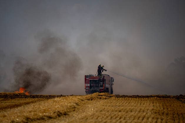 Forest fire breaks out in Czech Republic VETRKOVICE, CZECH REPUBLIC - JULY 30: Firefighters battle flames as vegetation and a nearby field burn during a forest fire in Vetrkovice (Moravian-Silesian Region), Czech Republic on July 30, 2026. The fire is being extinguished by 30 units of firefighters, which is approximately 150 firefighters, according to the press spokesperson of the fire department. Also two Black Hawk helicopters and a police Bell. The area affected by the fire is approximately 27 hectares. Lukas Kabon Anadolu Vetrkovice Czech Republic. Editorial use only. Please get in touch for any other usage.  Copyright: x2026xAnadoluxLukasxKabonx
