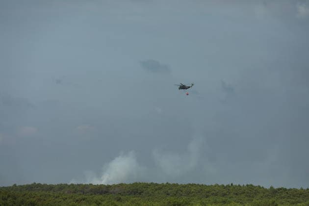 France continues wildfire battle as heat wave keeps Europe on alert BORDEAUX, FRANCE - JULY 30: Firefighters continue efforts to contain a wildfire near Bordeaux in southwestern France as France and Spain battle multiple blazes amid high temperatures and the risk of flare-ups, with active fires reported in Gironde, Var and Cote-d Or and 21 French departments under orange heatwave alerts on July 30, 2026. Four firefighters are injured while battling a fire in the Var department before it is brought under control overnight, including one who suffers a fracture and others affected by minor smoke inhalation, while operations remain difficult due to intense heat and expected southwesterly winds, although crews in Gironde express optimism after a  Copyright: x2026xAnadoluxMohamadxSalaheldinxAbdelghanixAlsayedx