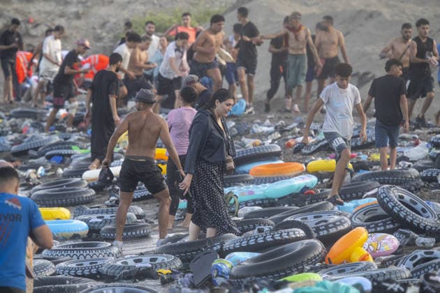 Hundreds of migrants reach Spain s Ceuta after swimming from Morocco CEUTA, SPAIN - JULY 30: Hundreds of migrants have attempted to swim from Morocco to the Spanish city of Ceuta in North Africa, while the number of arrivals exceeded 1,500 in just over a week, according to local news in Cueta, Spain on July 30, 2026. As Moroccan and Algerian migrants attempted to reach Ceuta by swimming, most were reportedly intercepted by Moroccan patrol boats. Spain s Maritime Rescue Service and the Spanish Red Cross rescued 117 people from the water, while the Civil Guard assisted around 200 others with patrol boats. The Spanish Civil Guard also found two bodies which raised the death toll along Ceuta s coastline so far this year to 29. Marcos Moreno A  Copyright: x2026xAnadoluxMarcosxMorenox