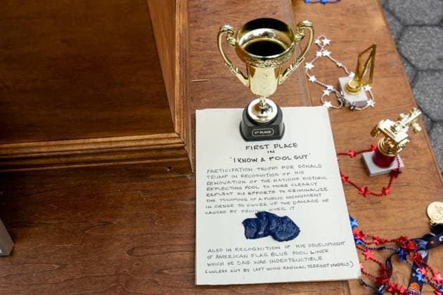 New York, NY- July 29: A 10 footÃ¢â‚¬Â Iran War Participation TrophyÃ¢â‚¬Â for the President of the USA in Manhattan Foley Square by Protest Art Group The Secret Handshake on July 30, 2026 Credit: Camara AdMedia USA  - ZUMAa123 20260730_zaa_a123_028 Copyright: xPorterx