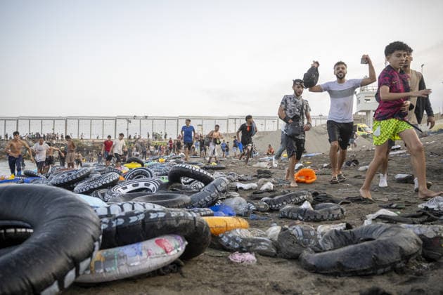 Hundreds of migrants reach Spain s Ceuta after swimming from Morocco CEUTA, SPAIN - JULY 30: Hundreds of migrants have attempted to swim from Morocco to the Spanish city of Ceuta in North Africa, while the number of arrivals exceeded 1,500 in just over a week, according to local news in Cueta, Spain on July 30, 2026. As Moroccan and Algerian migrants attempted to reach Ceuta by swimming, most were reportedly intercepted by Moroccan patrol boats. Spain s Maritime Rescue Service and the Spanish Red Cross rescued 117 people from the water, while the Civil Guard assisted around 200 others with patrol boats. The Spanish Civil Guard also found two bodies which raised the death toll along Ceuta s coastline so far this year to 29. Marcos Moreno A  Copyright: x2026xAnadoluxMarcosxMorenox
