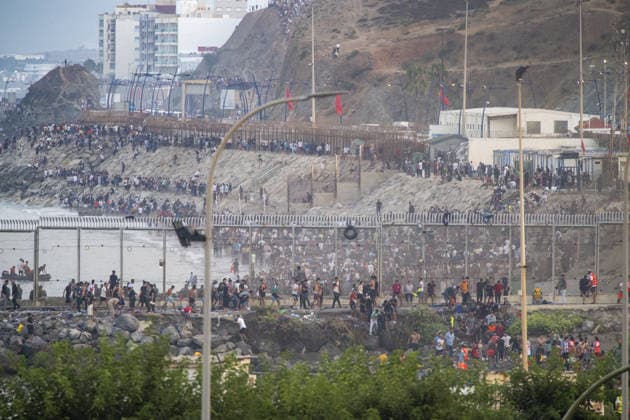 Hundreds of migrants reach Spain s Ceuta after swimming from Morocco CEUTA, SPAIN - JULY 30: Hundreds of migrants have attempted to swim from Morocco to the Spanish city of Ceuta in North Africa, while the number of arrivals exceeded 1,500 in just over a week, according to local news in Cueta, Spain on July 30, 2026. As Moroccan and Algerian migrants attempted to reach Ceuta by swimming, most were reportedly intercepted by Moroccan patrol boats. Spain s Maritime Rescue Service and the Spanish Red Cross rescued 117 people from the water, while the Civil Guard assisted around 200 others with patrol boats. The Spanish Civil Guard also found two bodies which raised the death toll along Ceuta s coastline so far this year to 29. Marcos Moreno A  Copyright: x2026xAnadoluxMarcosxMorenox
