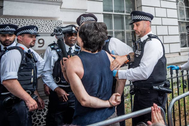 Palestine Action Arrests in London, UK - 30 Jul 2026 A supporter of Palestine Action is arrested by Police outside Westminster Magistrates Court. Hundreds of pro-Palestinian activists gathered outside Westminster Magistrates Court to defy Section 12 of the Terrorist Act by declaring support of proscribed group Palestine Action. They were protesting at a hearing for the prosecution of 1500 supporters previously arrested for holding up signs that have been deemed unlawful. London United Kingdom Copyright: xLabxMox xSOPAxImagesx LabMO_PALESTINE_ACTION_ARRESTS_SOPA_28.jpeg