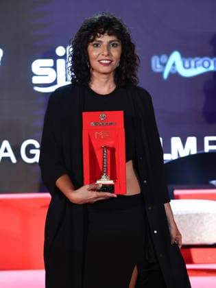 IPA87125997 - Soverato (CZ), Magna Graecia Film Festival - Day 6. Pictured: Irene Maiorino with the Golden Column  Copyright: xMarcoxProvvisionatox xMarcoxProvvisionatox 87125997