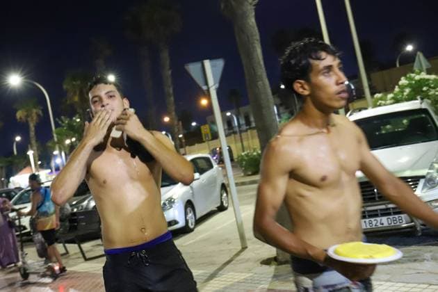 July 30, 2026, Melilla, Spain: MELILLA, Spain Ã¢â‚¬ July 31, 2026: Spanish security forces respond to a large-scale migrant crossing attempt along Melilla s border with Morocco after hundreds of migrants tried to enter the Spanish enclave through the Dique Sur, Barrio Chino, and the Beni-Enzar and Farhana border crossings. Authorities also reported attempted breaches of the border fence at Barrio Chino and Beni-Enzar, where riot-control measures were deployed. According to preliminary estimates, around 400 migrants reached Melilla by land and sea, while the Beni-Enzar border crossing was closed until further notice. The incident comes amid increased migratory pressure affecting the Spanish enclaves of Melilla and Ceuta. Melilla Spain  - ZUMAq101 20260730_zna_q101_111 Copyright: xMohaxBelkasenx