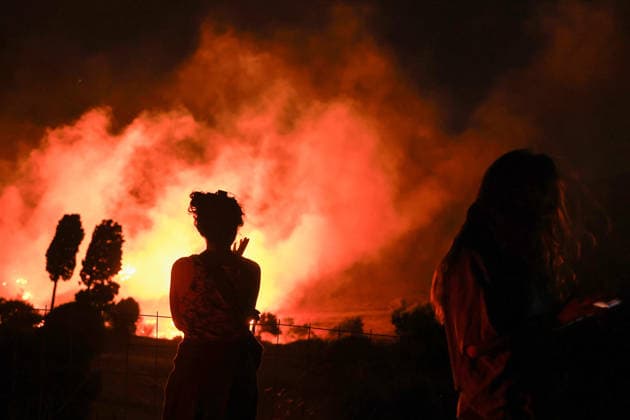 Firefighters battle wildfire near Preveli village on Greece s Crete Island RETHYMNO, GREECE - JULY 30: Firefighters battle a wildfire burning near the village of Preveli in the Rethymno region on the island of Crete, Greece, on July 30, 2026. Fire crews continue efforts to contain the blaze as it spreads through the area. Costas Baltas Anadolu Rethymno Greece. Editorial use only. Please get in touch for any other usage.  Copyright: x2026xAnadoluxCostasxBaltasx