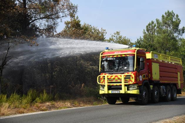 France continues wildfire battle as heat wave keeps Europe on alert BORDEAUX, FRANCE - JULY 30: Firefighters inspect and secure a wildfire-affected forest near Bordeaux, France, on July 30, 2026, as they continue operations to extinguish flare-ups and prevent the fire from reigniting. Fire crews remain deployed following the evacuation of nearby campsites and the closure of beaches due to the wildfire threat. Dragan Lekic Anadolu Bordeaux France. Editorial use only. Please get in touch for any other usage.  Copyright: x2026xAnadoluxDraganxLekicx