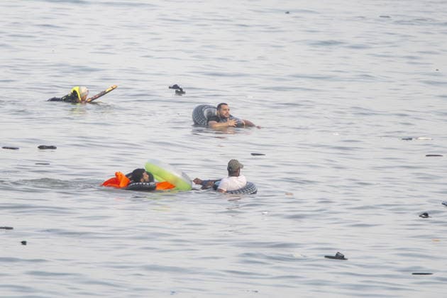 Hundreds of migrants reach Spain s Ceuta after swimming from Morocco CEUTA, SPAIN - JULY 30: Hundreds of migrants have attempted to swim from Morocco to the Spanish city of Ceuta in North Africa, while the number of arrivals exceeded 1,500 in just over a week, according to local news in Cueta, Spain on July 30, 2026. As Moroccan and Algerian migrants attempted to reach Ceuta by swimming, most were reportedly intercepted by Moroccan patrol boats. Spain s Maritime Rescue Service and the Spanish Red Cross rescued 117 people from the water, while the Civil Guard assisted around 200 others with patrol boats. The Spanish Civil Guard also found two bodies which raised the death toll along Ceuta s coastline so far this year to 29. Marcos Moreno A  Copyright: x2026xAnadoluxMarcosxMorenox