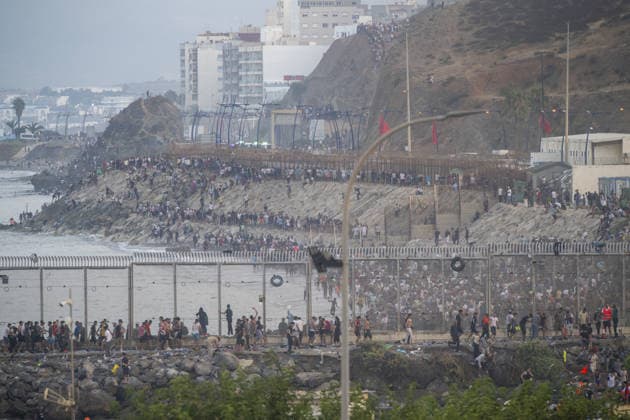Hundreds of migrants reach Spain s Ceuta after swimming from Morocco CEUTA, SPAIN - JULY 30: Hundreds of migrants have attempted to swim from Morocco to the Spanish city of Ceuta in North Africa, while the number of arrivals exceeded 1,500 in just over a week, according to local news in Cueta, Spain on July 30, 2026. As Moroccan and Algerian migrants attempted to reach Ceuta by swimming, most were reportedly intercepted by Moroccan patrol boats. Spain s Maritime Rescue Service and the Spanish Red Cross rescued 117 people from the water, while the Civil Guard assisted around 200 others with patrol boats. The Spanish Civil Guard also found two bodies which raised the death toll along Ceuta s coastline so far this year to 29. Marcos Moreno A  Copyright: x2026xAnadoluxMarcosxMorenox