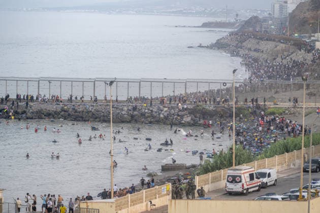 Hundreds of migrants reach Spain s Ceuta after swimming from Morocco CEUTA, SPAIN - JULY 30: Hundreds of migrants have attempted to swim from Morocco to the Spanish city of Ceuta in North Africa, while the number of arrivals exceeded 1,500 in just over a week, according to local news in Cueta, Spain on July 30, 2026. As Moroccan and Algerian migrants attempted to reach Ceuta by swimming, most were reportedly intercepted by Moroccan patrol boats. Spain s Maritime Rescue Service and the Spanish Red Cross rescued 117 people from the water, while the Civil Guard assisted around 200 others with patrol boats. The Spanish Civil Guard also found two bodies which raised the death toll along Ceuta s coastline so far this year to 29. Marcos Moreno A  Copyright: x2026xAnadoluxMarcosxMorenox