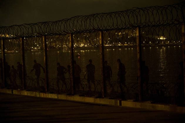 Moroccan forces block migrants from reaching Ceuta near Fnideq FNIDEQ, MOROCCO - JULY 30: Moroccan security forces deploy near the northern city of Fnideq as thousands of irregular migrants attempt to reach Ceuta, Spain s territory in North Africa, on July 30, 2026 in Fnideq, Morocco. Security forces prevented the migrants from crossing during the night between Thursday and Friday. Some migrants were detained and transported outside the city, while security operations continued across the area. Hicham Rachidi Anadolu Fnideq Morocco. Editorial use only. Please get in touch for any other usage.  Copyright: x2026xAnadoluxHichamxRachidix