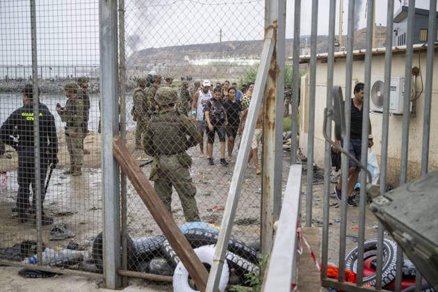 Migrants arrive on shore after attempting sea crossing to Ceuta from Morocco CEUTA, SPAIN - JULY 31: Security forces take measures, monitor the area in the Spanish city of Ceuta in North Africa following an attempted sea crossing by migrants from Morocco on July 31, 2026. Spanish and Moroccan authorities carried out operations along the coast as migrants attempted to reach Ceuta by sea. Marcos Moreno Anadolu Ceuta Spain. Editorial use only. Please get in touch for any other usage.  Copyright: x2026xAnadoluxMarcosxMorenox