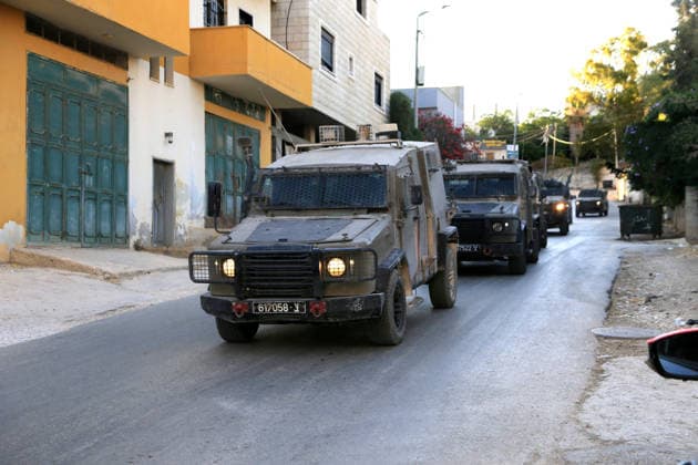 Palestinian-Israeli conflict - 31 Jul 2026 Israeli military vehicles withdrew after an Israeli army operation in the village of Salem, east of Nablus in the West Bank. The operation included raids and searches of Palestinian homes, resulting in the arrest of two brothers and a third person, following a heavy deployment of forces throughout the village. Nablus Palestine Copyright: xNasserxIshtayehx xSOPAxImagesx Nishtayeh241