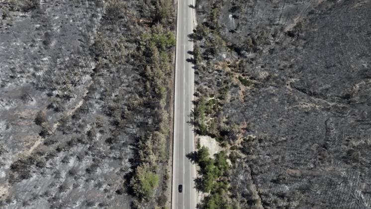 Aerial view shows fire-damaged forest area in Fethiye, Mugla MUGLA, TURKIYE - JULY 31: An aerial view shows the forested area damaged by a fire in the Fethiye district of Mugla, Turkiye on July 31, 2026. The wildfire left visible damage across the woodland area. Ali Riza Akkir Anadolu Mugla Turkey. Editorial use only. Please get in touch for any other usage.  Copyright: x2026xAnadoluxAlixRizaxAkkirx