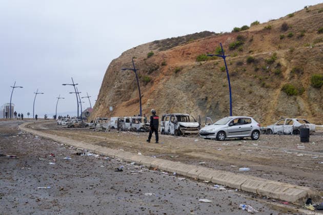 Moroccan forces block irregular migrants attempting to reach Ceuta FNIDEQ, MOROCCO - JULY 31: Damaged vehicles remain on a road near the border with Ceuta following clashes between Moroccan security forces and irregular migrants, on July 31, 2026 in Fnideq, Morocco. Authorities blocked roads across the northern city and deployed additional security measures to prevent migrants from reaching Ceuta, the Spanish-administered territory in North Africa. Hicham Rachidi Anadolu Fnideq Fas. Editorial use only. Please get in touch for any other usage.  Copyright: x2026xAnadoluxHichamxRachidix