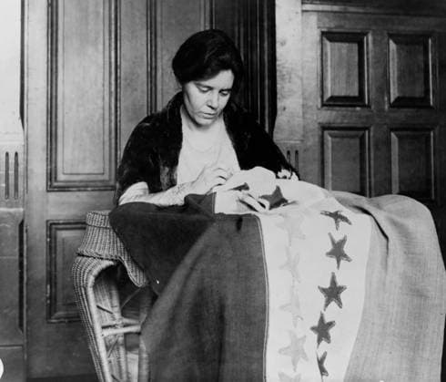 RECORD DATE NOT STATED Portrait of Alice Paul, sewing suffrage flag. Alice Paul, half-length portrait, seated, sewing suffrage flag. Between 1912 and 1920. Editorial use only. All other uses to be cleared with the copyright owner (World History Archive), in advance., WHA_034_0658.jpg, Alice Paul; suffrage; flag; sewing; portrait; women s rights; activism; suffragette; historical; feminist; leader; political; movement; empowerment; equality; American history; 1910s; 1920s; women s suffrage; voting rights; social change; gender equality; political activism; suffrage movement; American women; sewing flag; political leader; women s movement; suffrage flag; women s empowerment. Copyright: xx