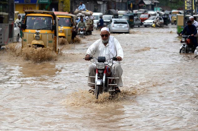 Death toll from rains, flash floods rises to 121 across Pakistan PESHAWAR, PAKISTAN, JULY, 31: Residents wade through floodwaters after heavy monsoon rains caused urban flooding in Peshawar, Pakistan, on July 31, 2026. The death toll from rains, flash floods and landslides across Pakistan has risen to 121 during the ongoing monsoon season, the country’s National Disaster Management Authority (NDMA) said. Hussain Ali Anadolu Peshawar Pakistan. Editorial use only. Please get in touch for any other usage.  Copyright: x2026xAnadoluxHussainxAlix