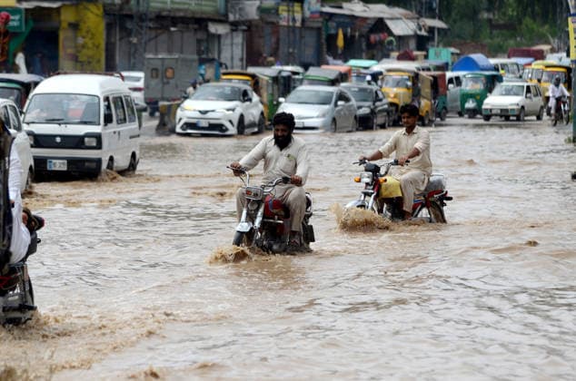 Death toll from rains, flash floods rises to 121 across Pakistan PESHAWAR, PAKISTAN, JULY, 31: Residents wade through floodwaters after heavy monsoon rains caused urban flooding in Peshawar, Pakistan, on July 31, 2026. The death toll from rains, flash floods and landslides across Pakistan has risen to 121 during the ongoing monsoon season, the country’s National Disaster Management Authority (NDMA) said. Hussain Ali Anadolu Peshawar Pakistan. Editorial use only. Please get in touch for any other usage.  Copyright: x2026xAnadoluxHussainxAlix