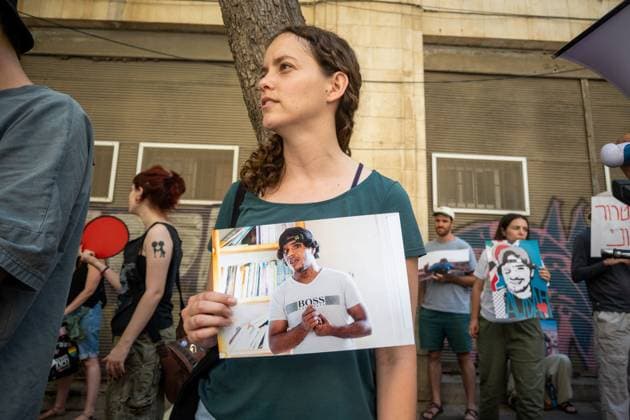Protesters Demand Justice for Palestinian Activist Odeh Hadalin in Jerusalem JERUSALEM, Israel July 31, 2026: Demonstrators gather outside the Jerusalem District Attorney™s Office to commemorate Palestinian activist and teacher Odeh Hadalin, who was killed last year in Umm al-Khair, South Hebron Hills. Organized by several left-wing groups, the protest called for those responsible for his killing to be brought to justice and denounced ongoing settler violence against Palestinians in the occupied West Bank. During the demonstration, several passersby confronted protesters and seized some of their signs. Jerusalem Israel Copyright: x xjessxflomx xJNAxPressx