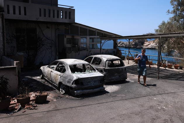 Aftermath of the devastating Crete wildfire CRETE, GREECE - JULY 31: Cars are seen burnt outside a destroyed hotel, after a wildfire at the village of Agios Pavlos, in the region Rethymno, on the island of Crete, Greece, on July 31, 2026. Costas Baltas Anadolu Crete Greece. Editorial use only. Please get in touch for any other usage.  Copyright: x2026xAnadoluxCostasxBaltasx