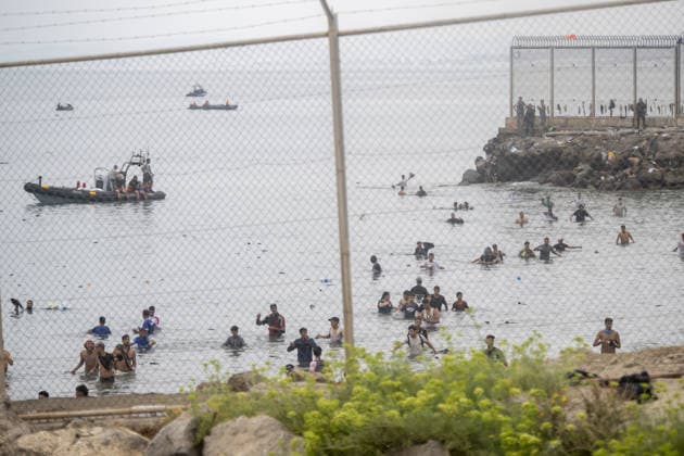 Hundreds of migrants reach Spain s Ceuta after swimming from Morocco CEUTA, SPAIN - JULY 31: Hundreds of migrants attempt to swim from Morocco to the Spanish city of Ceuta in North Africa, while the number of arrivals exceeded 1,500 in just over a week, according to local news, in Ceuta, Spain on July 31, 2026. Marcos Moreno Anadolu Ceuta Spain. Editorial use only. Please get in touch for any other usage.  Copyright: x2026xAnadoluxMarcosxMorenox