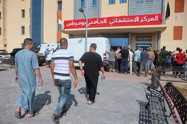 At least 25 killed, 44 injured as passenger bus overturns in northern Algeria BOUMERDES, ALGERIA - JULY 31: Relatives of victims gather outside the Boumerdes University Hospital following a deadly bus crash in Boumerdes, Algeria, on July 31, 2026. A passenger bus traveling from the eastern Setif province to northern Boumerdes veered off the road and overturned, leaving 25 people dead and 44 others injured. Hamza Zait Anadolu Boumerdes Algeria. Editorial use only. Please get in touch for any other usage.  Copyright: x2026xAnadoluxHamzaxZaitx