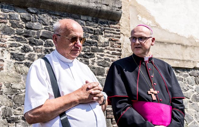 From left priest Karel Havelka and Prague Archbishop Stanislav Pribyl are seen during the memorial event to commemorate 1945 Usti nad Labem massacre of Sudeten Germans following the end of World War II in Usti nad Labem, Czech Republic, on July 31, 2026. (CTKxPhoto VojtechxHajek) CTKPhotoP2026073106058  CTKPhotoP2026073106058