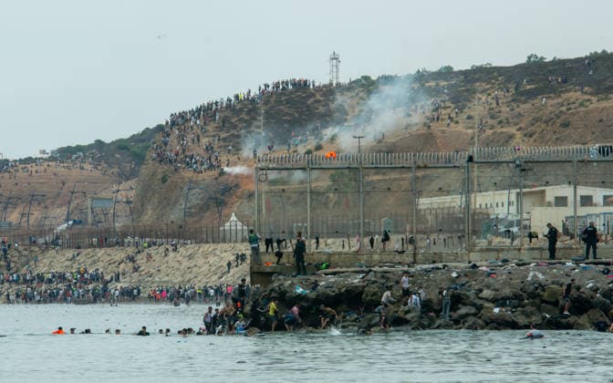 July 31, 2026, Ceuta, Ceuta, Spain: Spain s Guardia Civil officers contol as migrants try to swim through the waters close to the border with Morocco to enter Spain s north Africa s Ceuta enclave on July 31, 2026 Ceuta Spain  - ZUMAd308 20260731_zsp_d308_001 Copyright: xJuanxCarlosxLucasx