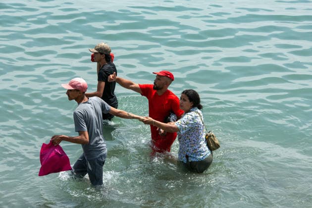 July 31, 2026, Ceuta, Ceuta, Spain: Hundreds of migrants attempt to swim from Morocco to the Spanish city of Ceuta in North Africa. Ceuta Spain  - ZUMAd308 20260731_zsp_d308_055 Copyright: xJuanxCarlosxLucasx