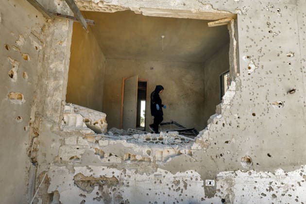 July 31, 2026, Zawtar Al-Gharbieh, Zawtar Al-Gharbieh, Lebanon: Lebanese Ihsan Yaghi, gestures as she stands inside her destroyed and burned house in the southern Lebanese village of Zawatar al-Gharbieh. Civilians started returning slowly the devastated hamlet after the army deployed inside the village following an Israeli withdrawal from several points inside it. Zawtar Al-Gharbieh Lebanon  - ZUMAn313 20260731_zip_n313_015 Copyright: xMarwanxNaamanix