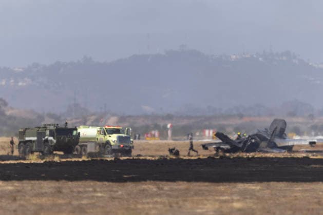 July 31, 2026, San Diego, Ca, United States: San Diego, CA - Crews work to douse a F-35 fighter jet that crashed near the run way at Marine Corps Air Station Miramar on Friday, July 31, 2026, in San Diego, CA. San Diego United States  - ZUMAs44_ 20260731_zaf_s44_002 Copyright: xLukejohnsonx