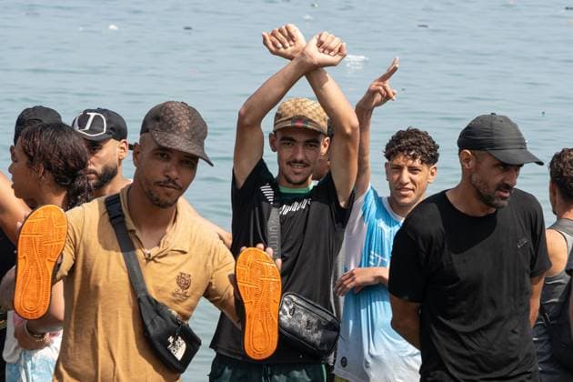 Heavy Migrant Movement at Ceuta Border CEUTA, SPAIN JULY 31, 2026: Migrants gather near the border crossing between Morocco and the Spanish enclave of Ceuta on July 31, 2026. Tens of thousands of migrants crossed into Ceuta from Morocco, while some continued to arrive and others voluntarily returned due to the precarious situation. Ceuta Spain Copyright: x xMarioxMoronx xJNAxPressx