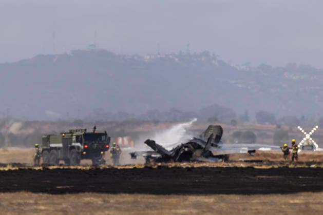 July 31, 2026, San Diego, Ca, US: San Diego, CA - Crews work to douse a F-35 fighter jet that crashed near the runway at Marine Corps Air Station Miramar on Friday, July 31, 2026, in San Diego, CA. San Diego US - ZUMAs44_ 20260731_zaf_s44_005 Copyright: xLukexJohnsonx
