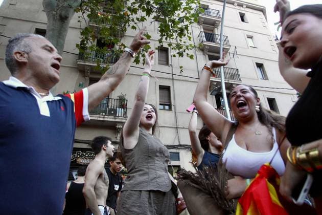 Far-right demonstration outside Moroccan Embassy in Barcelona BARCELONA, SPAIN JULY 31, 2026: Participants attend a demonstration outside the Moroccan Embassy in Barcelona following recent migration developments at Spain s North African enclave of Ceuta. Demonstrators wave Spanish flags, display banners and chant slogans during the protest, while some participants are seen making gestures commonly associated with Nazi salutes. Barcelona Spain Copyright: x xPabloxCarvajalxMunizagax xJNAxPressx