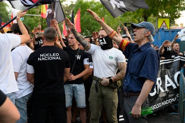 July 31, 2026, Madrid, Spain: MADRID, SPAIN Ã¢â‚¬ JULY 31, 2026: Participants attend a demonstration outside the Moroccan Embassy in Madrid, called by the far-right groups Falange EspaoÂ±ola and NoÂºcleo Nacional, following recent migrant arrivals through Spain s North African enclave of Ceuta. Protesters wave Spanish flags, display banners and chant slogans during the demonstration, while some participants are seen making gestures commonly associated with Nazi salutes. Madrid Spain  - ZUMAq101 20260731_zna_q101_207 Copyright: xTomasxCallex