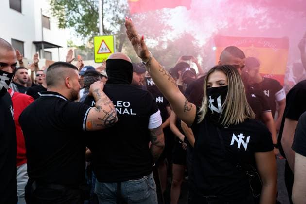 July 31, 2026, Madrid, Spain: MADRID, SPAIN Ã¢â‚¬ JULY 31, 2026: Participants attend a demonstration outside the Moroccan Embassy in Madrid, called by the far-right groups Falange EspaoÂ±ola and NoÂºcleo Nacional, following recent migrant arrivals through Spain s North African enclave of Ceuta. Protesters wave Spanish flags, display banners and chant slogans during the demonstration, while some participants are seen making gestures commonly associated with Nazi salutes. Madrid Spain  - ZUMAq101 20260731_zna_q101_211 Copyright: xTomasxCallex