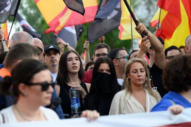 July 31, 2026, Madrid, Spain: MADRID, SPAIN Ã¢â‚¬ JULY 31, 2026: Participants attend a demonstration outside the Moroccan Embassy in Madrid, called by the far-right groups Falange EspaoÂ±ola and NoÂºcleo Nacional, following recent migrant arrivals through Spain s North African enclave of Ceuta. Protesters wave Spanish flags, display banners and chant slogans during the demonstration, while some participants are seen making gestures commonly associated with Nazi salutes. Madrid Spain  - ZUMAq101 20260731_zna_q101_221 Copyright: xTomasxCallex