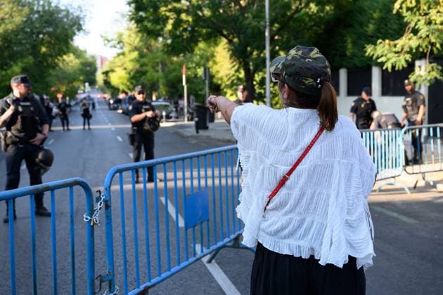 July 31, 2026, Madrid, Spain: MADRID, SPAIN Ã¢â‚¬ JULY 31, 2026: Participants attend a demonstration outside the Moroccan Embassy in Madrid, called by the far-right groups Falange EspaoÂ±ola and NoÂºcleo Nacional, following recent migrant arrivals through Spain s North African enclave of Ceuta. Protesters wave Spanish flags, display banners and chant slogans during the demonstration, while some participants are seen making gestures commonly associated with Nazi salutes. Madrid Spain - ZUMAq101 20260731_zna_q101_208 Copyright: xTomasxCallex