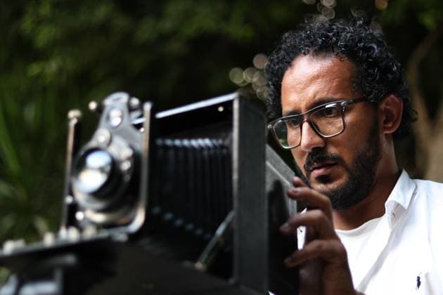 July 31, 2026, Cairo, Egypt: CAIRO, EGYPT Ã¢â‚¬ JULY 2026: Egyptian photojournalist Fareed Kotb poses with his restored 1930 Zeiss Ikon camera in Cairo, Egypt. Kotb gained international recognition for using the nearly century-old camera during his Project 1930, documenting the FIFA World Cup 2026 with a vintage camera manufactured in the same year as the inaugural FIFA World Cup. Cairo Egypt  - ZUMAq101 20260731_zna_q101_233 Copyright: xAbdullahxHamadax