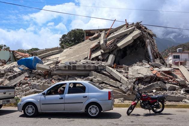 Cleanup operations continue in Caraballeda after disaster CARABALLEDA, LA GUAIRA, VENEZUELA JULY 30, 2026: Heavy machinery operates in the Caraballeda and Los Corales sectors of La Guaira state as crews carry out debris removal, sanitation work and ground leveling near residential areas. The continuous movement of dump trucks and earthmoving equipment reflects ongoing efforts to clear affected areas and prepare the terrain for recovery operations. La Guaira Venezuela (Bolivarian Republic of) Copyright: x xMarioxFloresx xJNAxPressx