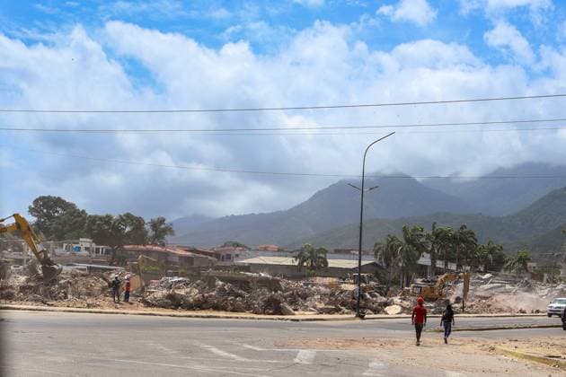 Cleanup operations continue in Caraballeda after disaster CARABALLEDA, LA GUAIRA, VENEZUELA JULY 30, 2026: Heavy machinery operates in the Caraballeda and Los Corales sectors of La Guaira state as crews carry out debris removal, sanitation work and ground leveling near residential areas. The continuous movement of dump trucks and earthmoving equipment reflects ongoing efforts to clear affected areas and prepare the terrain for recovery operations. La Guaira Venezuela (Bolivarian Republic of) Copyright: x xMarioxFloresx xJNAxPressx